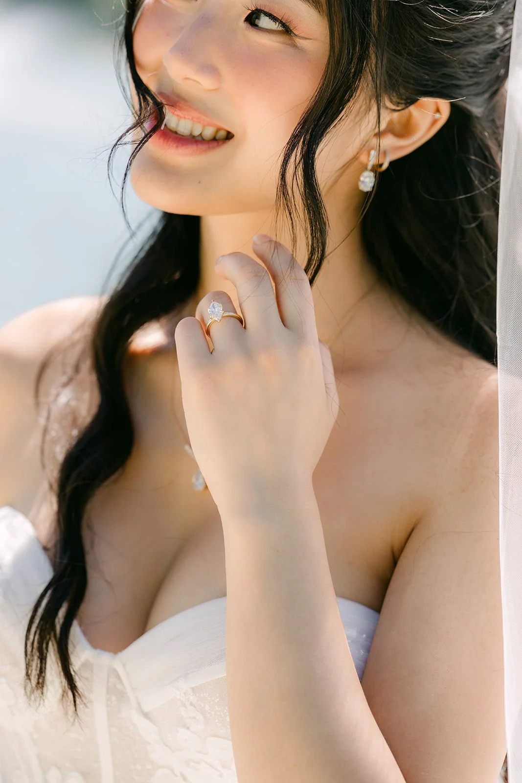 Clarissa laughing in a close bridal portrait