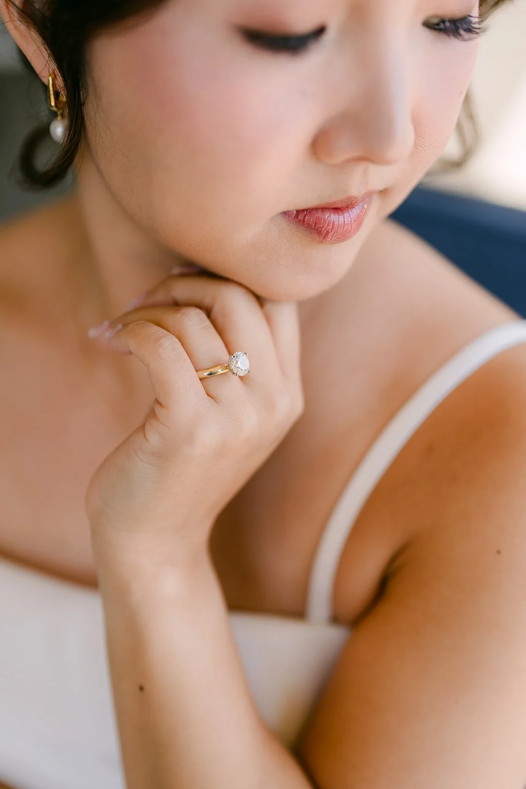 A bridal detail portrait with her engagement ring