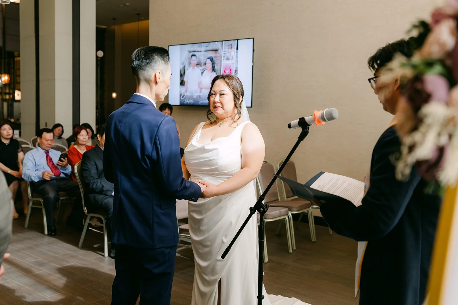 Mai and Bobby facing each other at the altar.