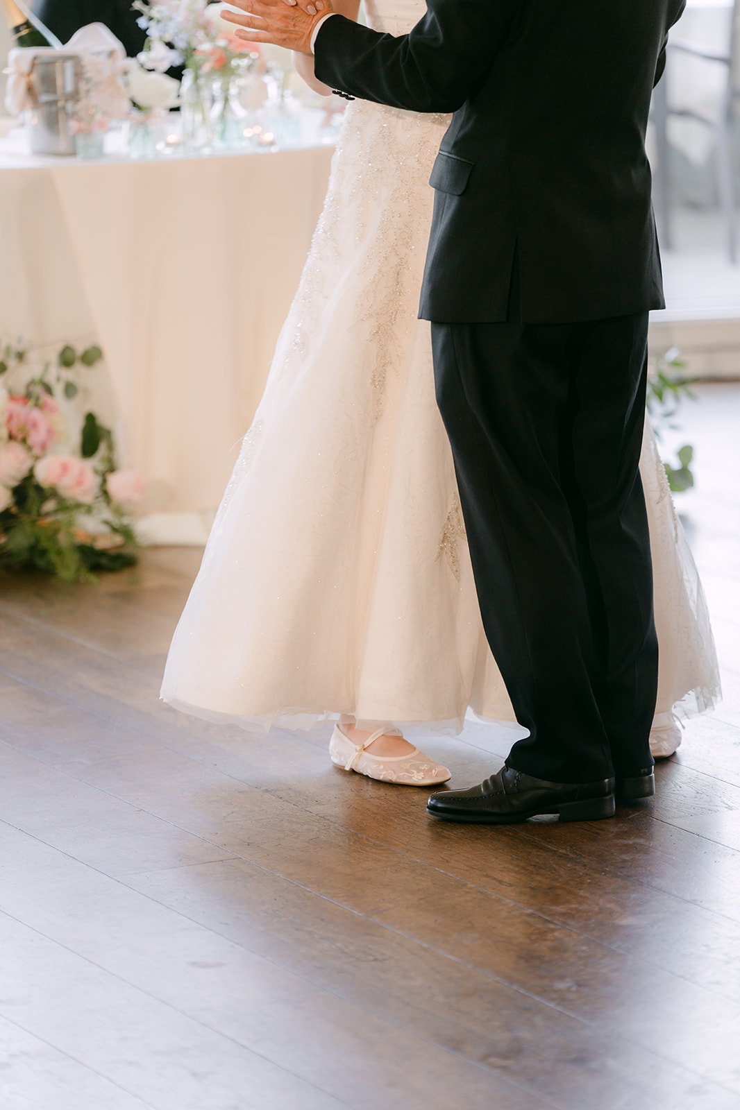 Joshua holding Judy close during their first dance