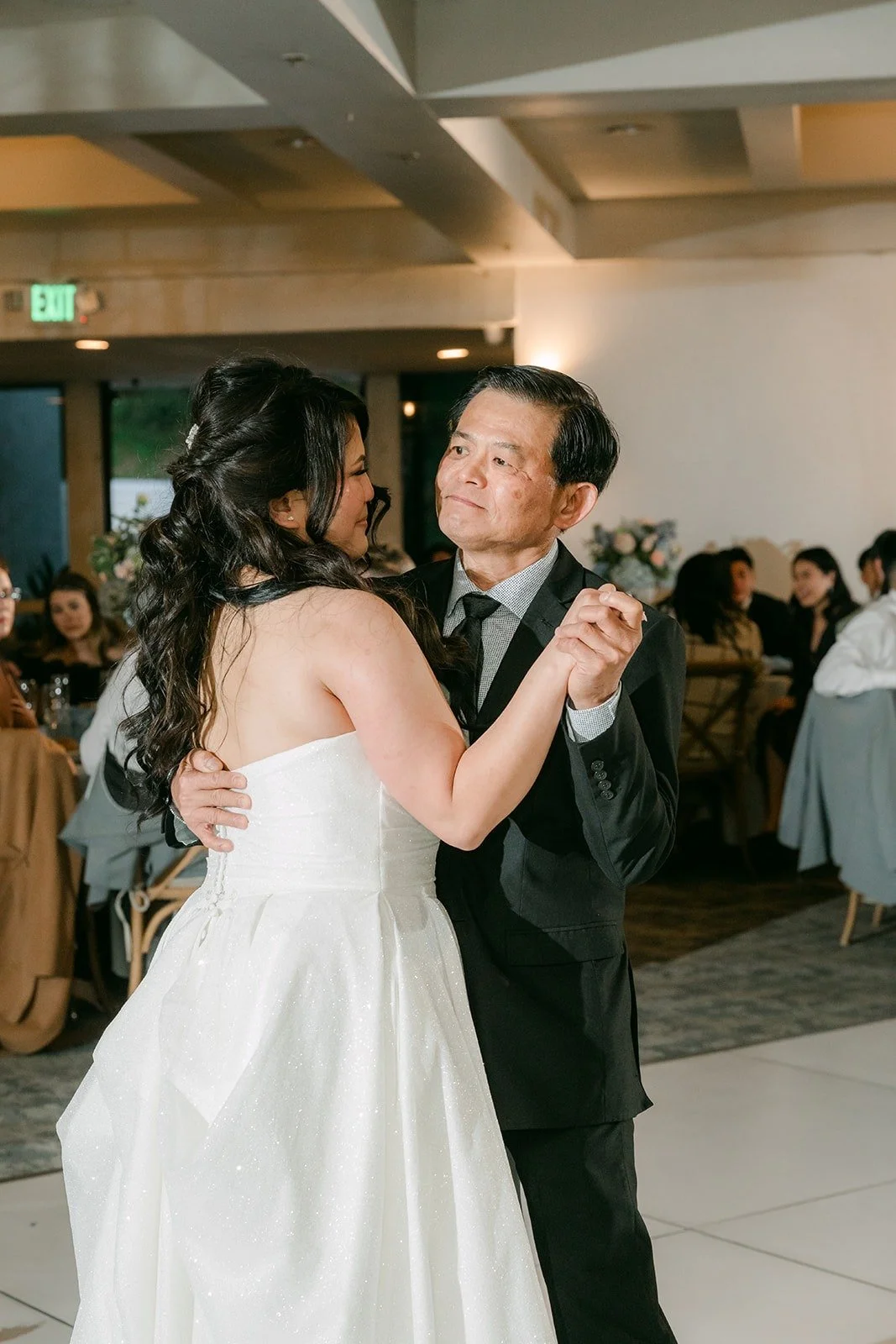 Florence smiling during a family dance