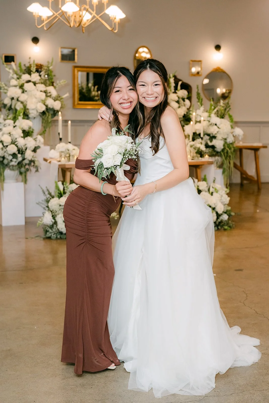 Jadee with the guest who caught the bouquet