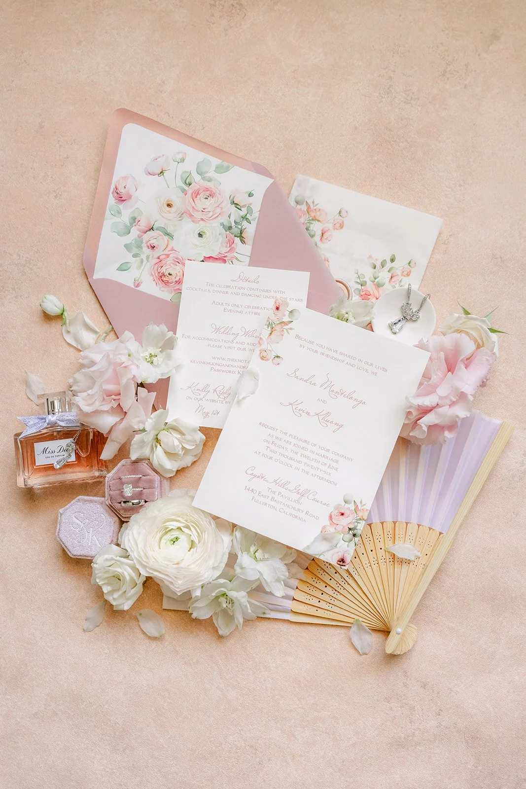 Sandra and Kevin's invitation suite with dusty pink florals.