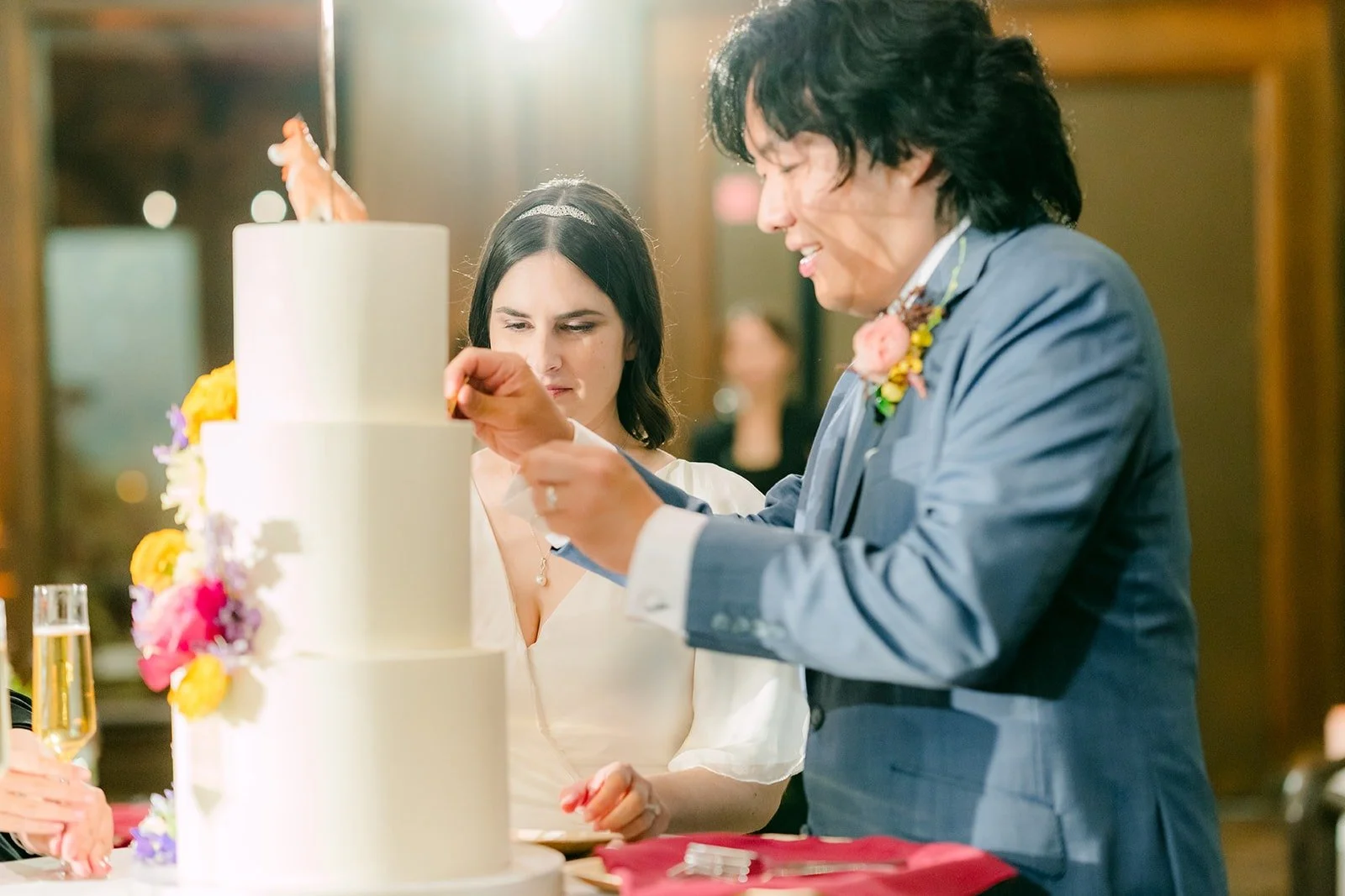Jessie and Philip cutting the cake