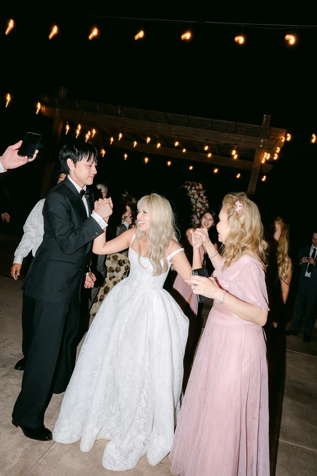Konitha dancing with her bridesmaids