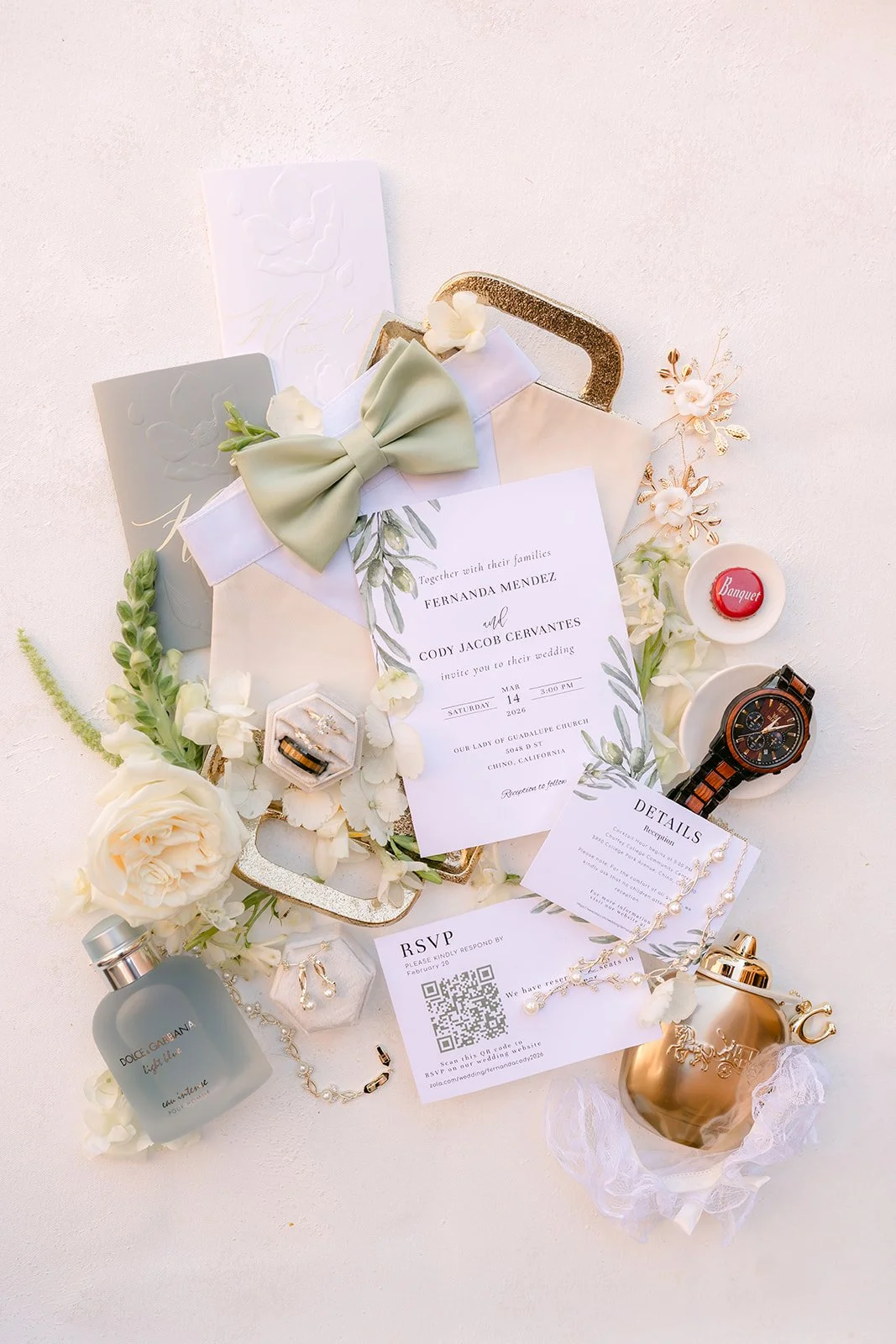 Fernanda's wedding details with a wax-sealed invitation, rings and white florals.