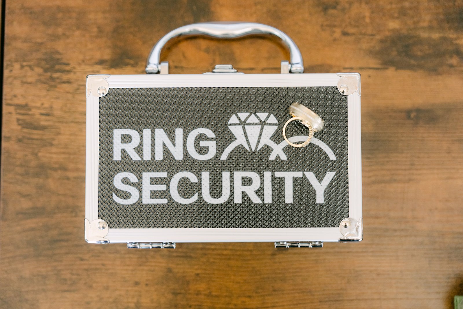 A Ring Security case carried by Nicole's brother Nathan, who had the real rings.