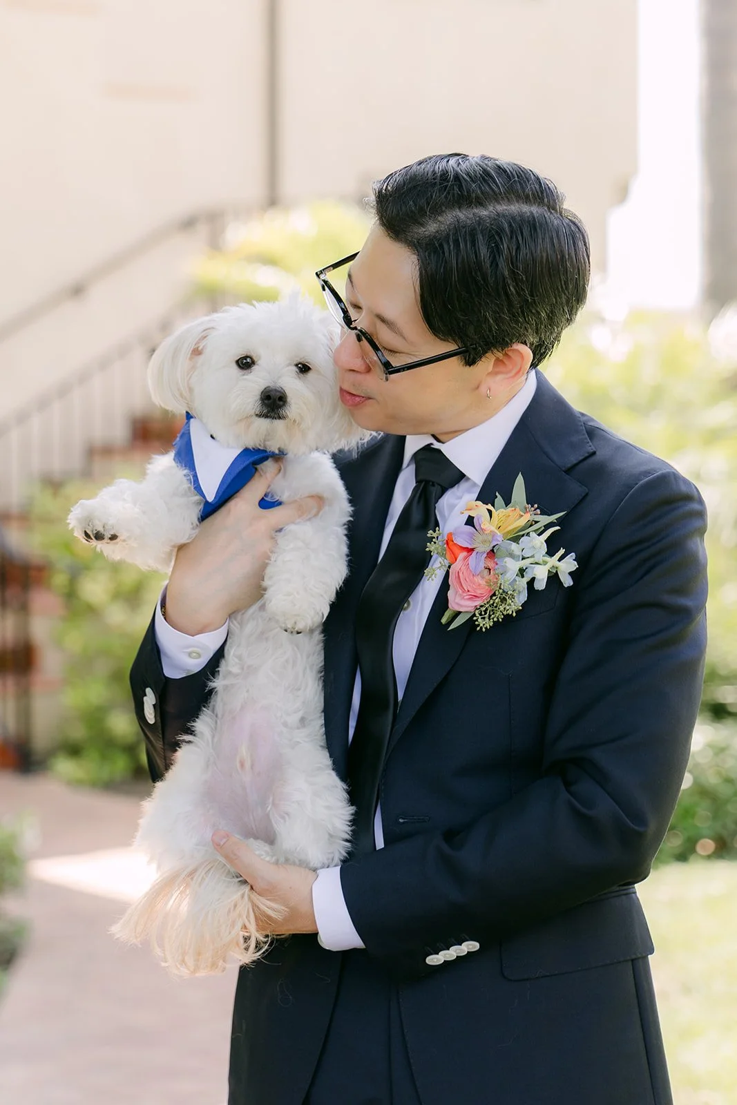 Leroy sneaking a kiss from the pup