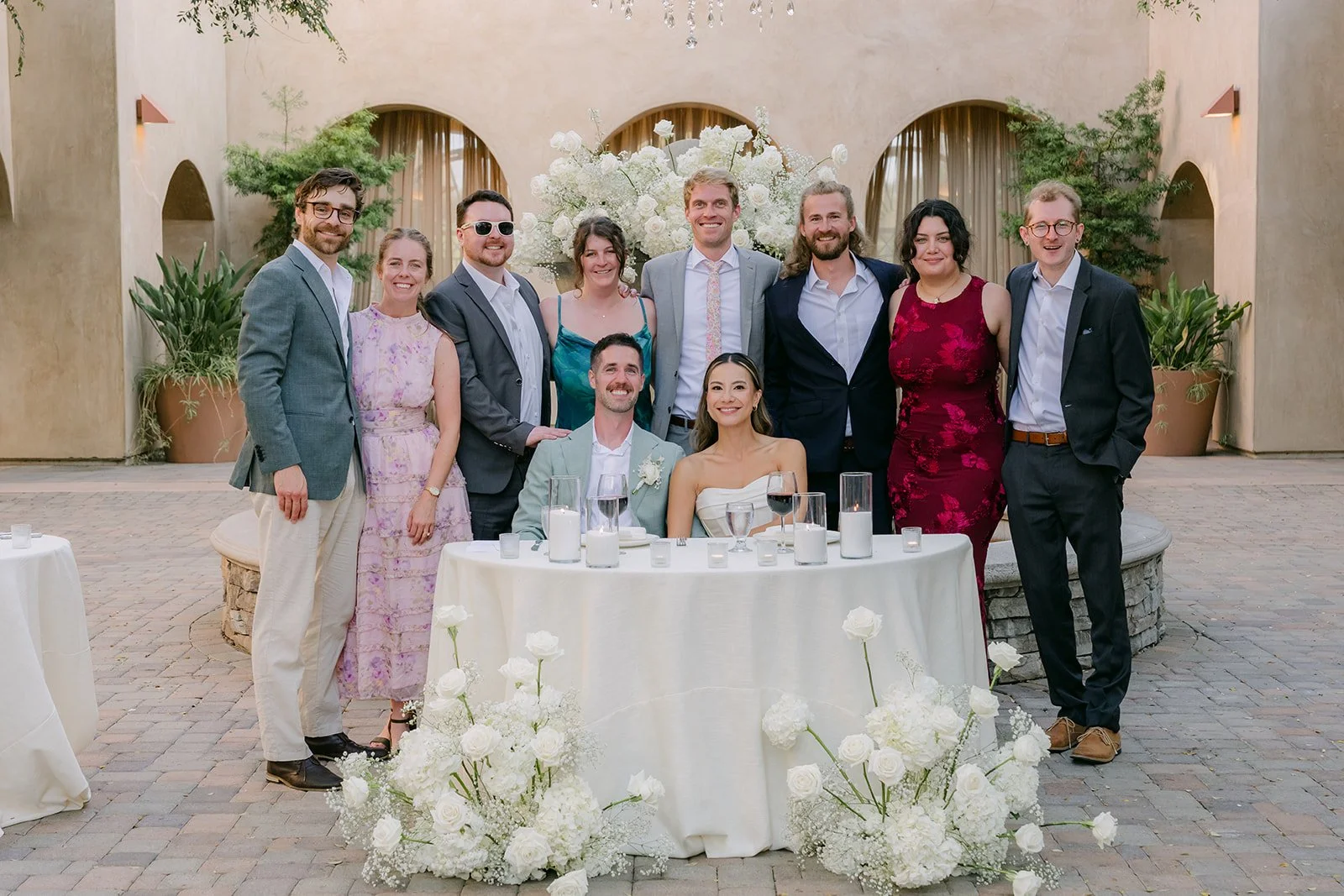 Family table photo in the courtyard, photographed by One and Only Production