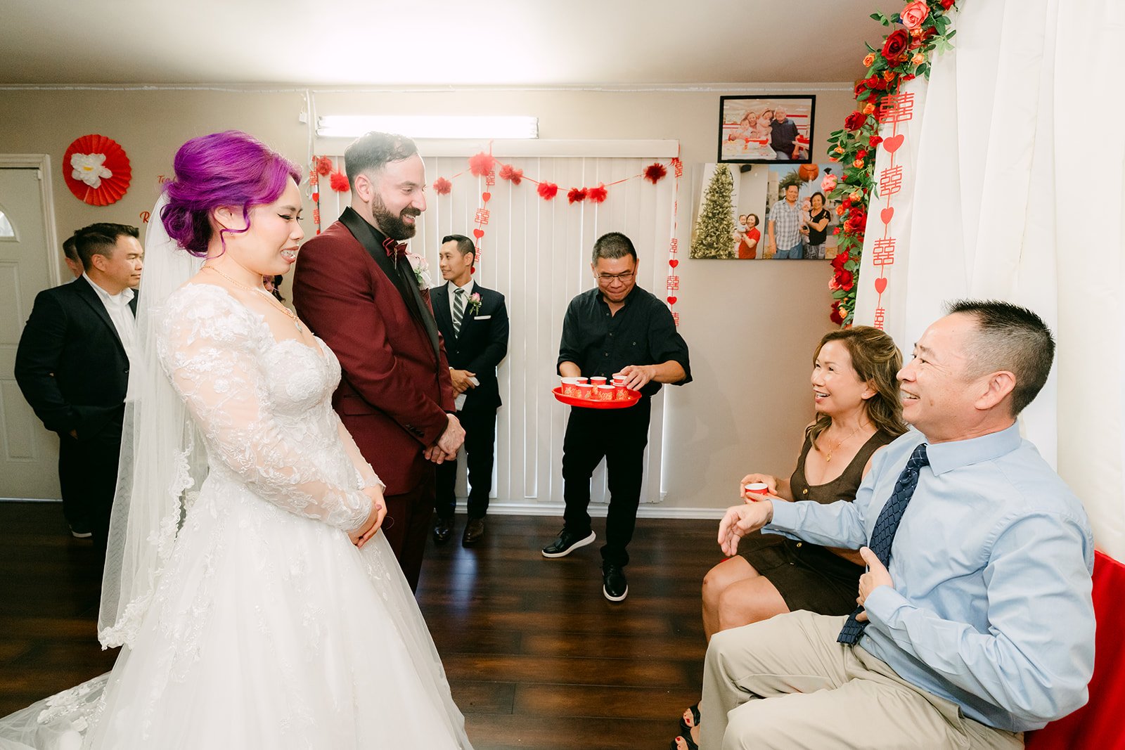 Vanessa and Ryan serving tea to a cousin.
