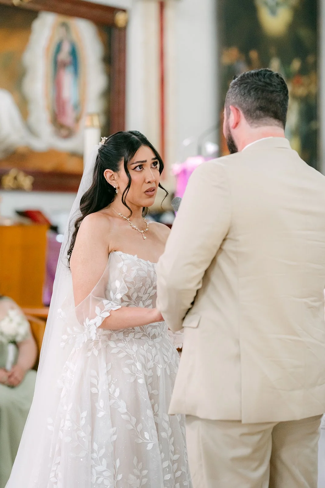 Fernanda smiling at Cody during the ceremony.
