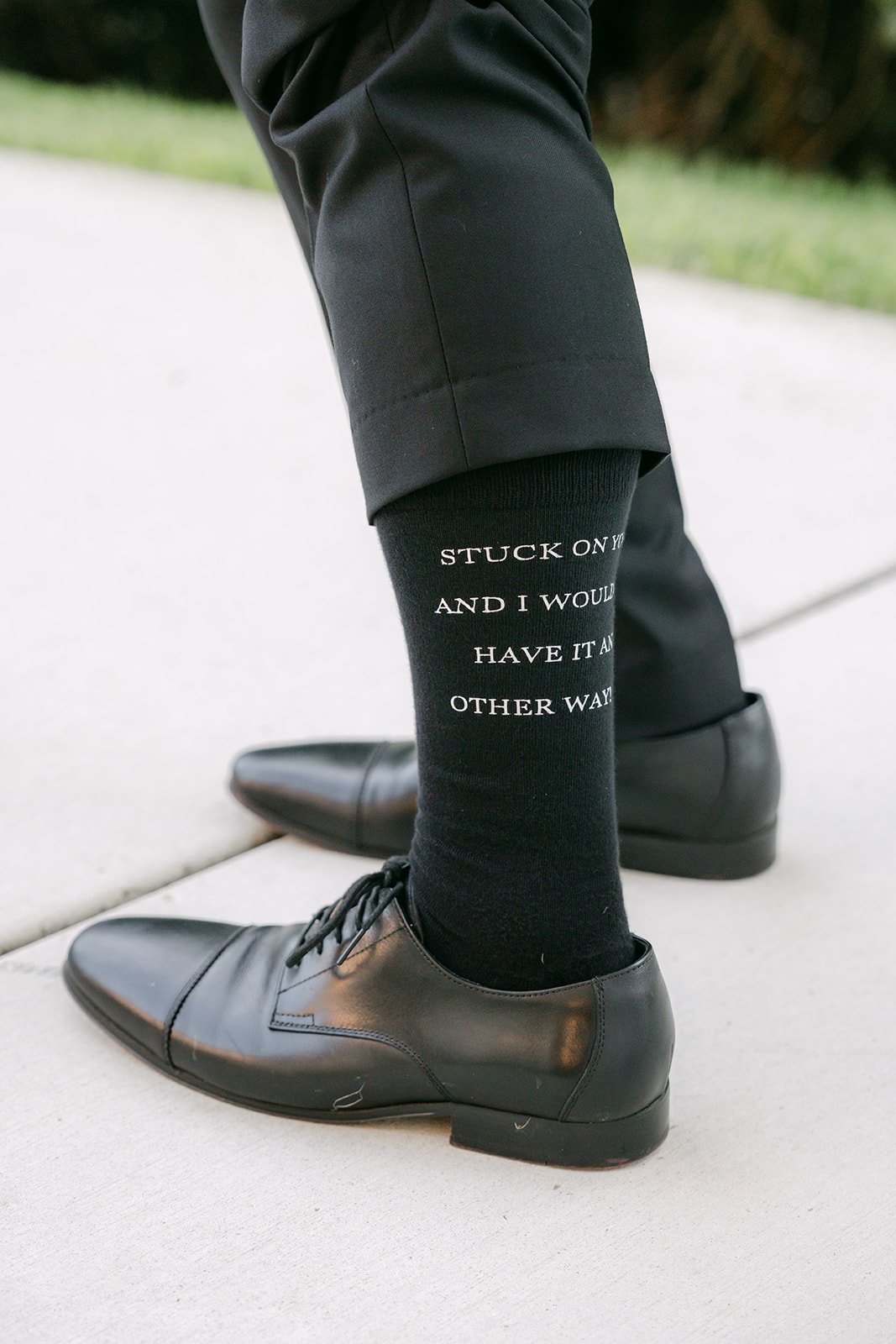 Austin's custom socks and black dress shoes