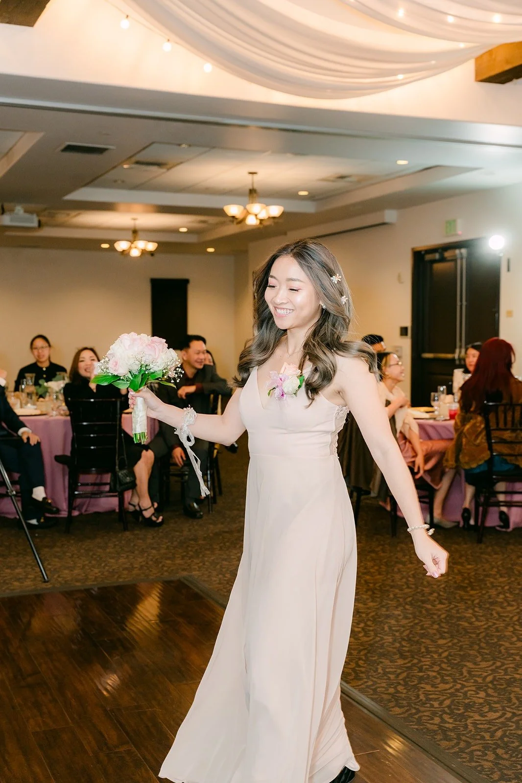 Linh walking in during the grand entrance