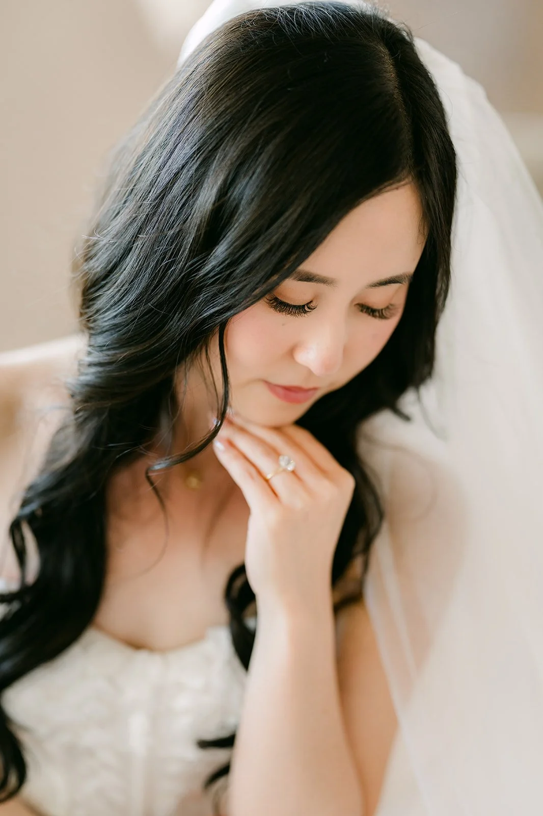 Bridal portrait of Kelley under her veil