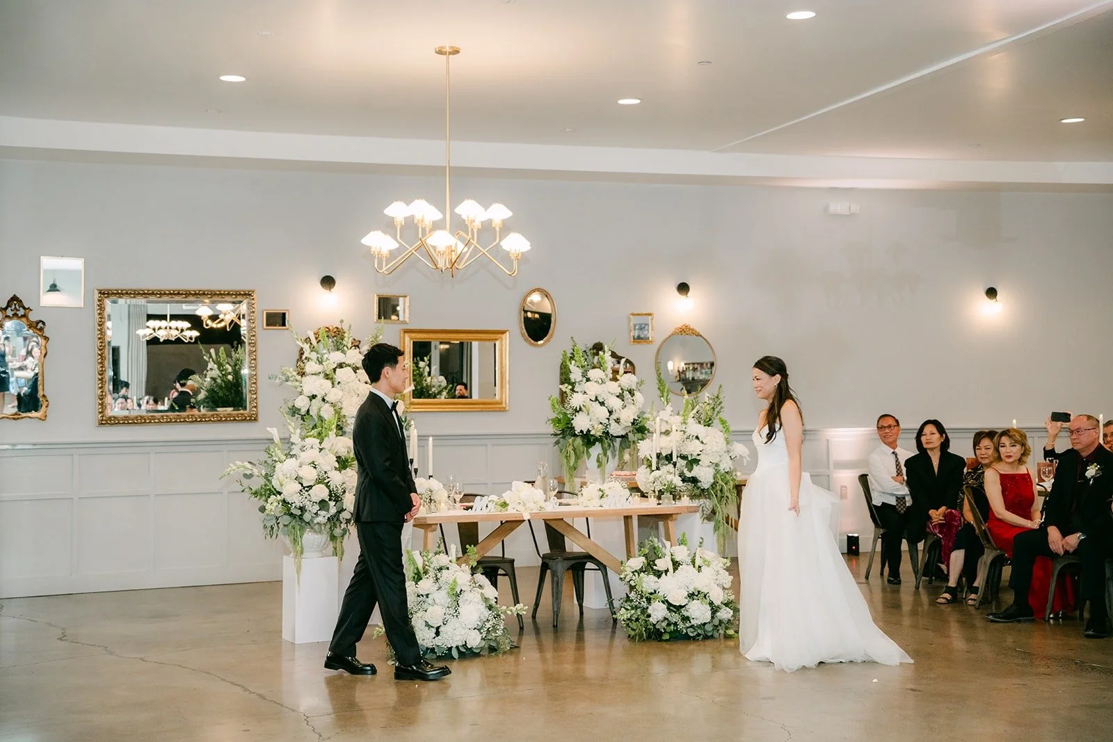 Jadee and Richard starting their first dance in the reception room at The Harper