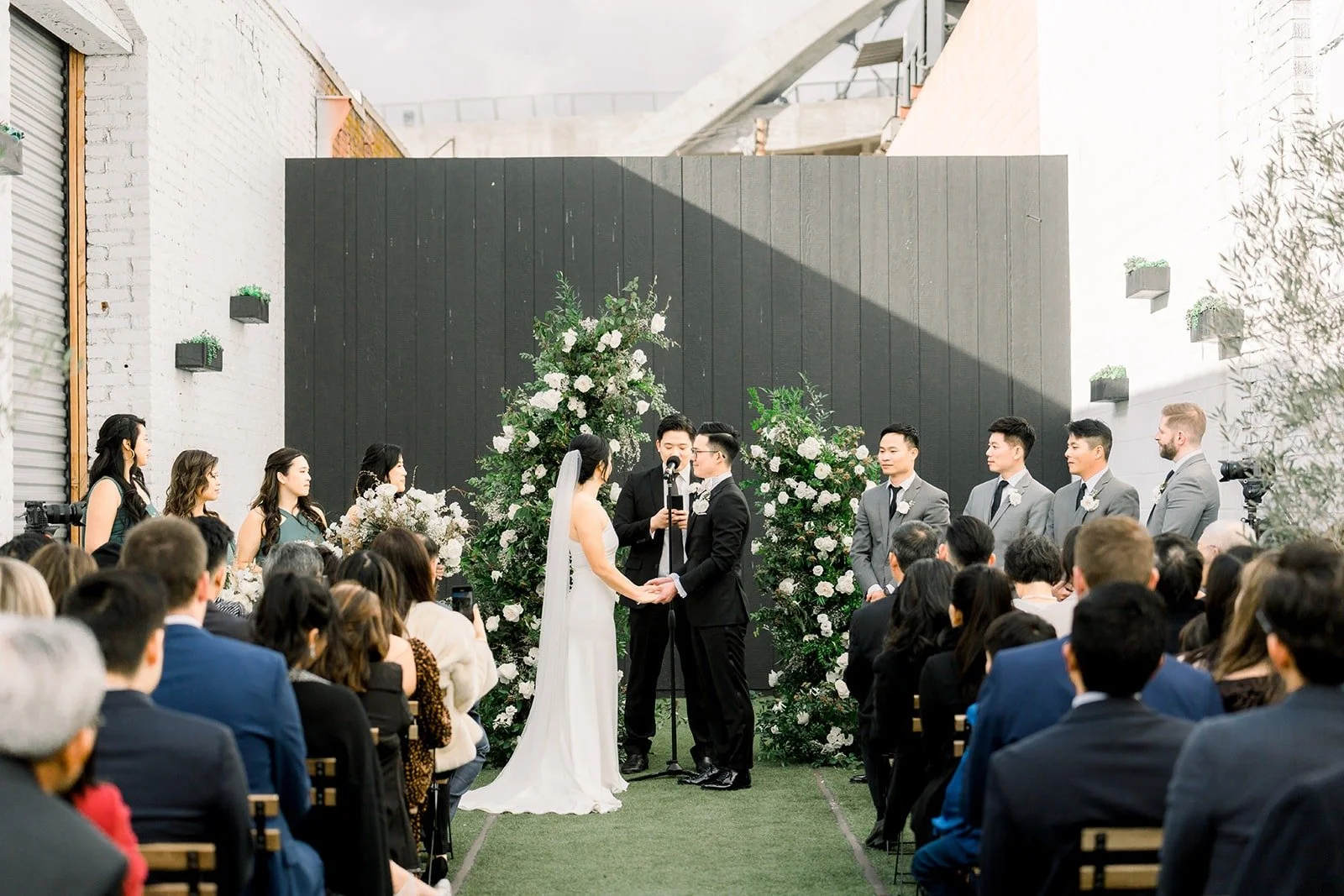 Wide view of the ceremony in the courtyard at The East Angel