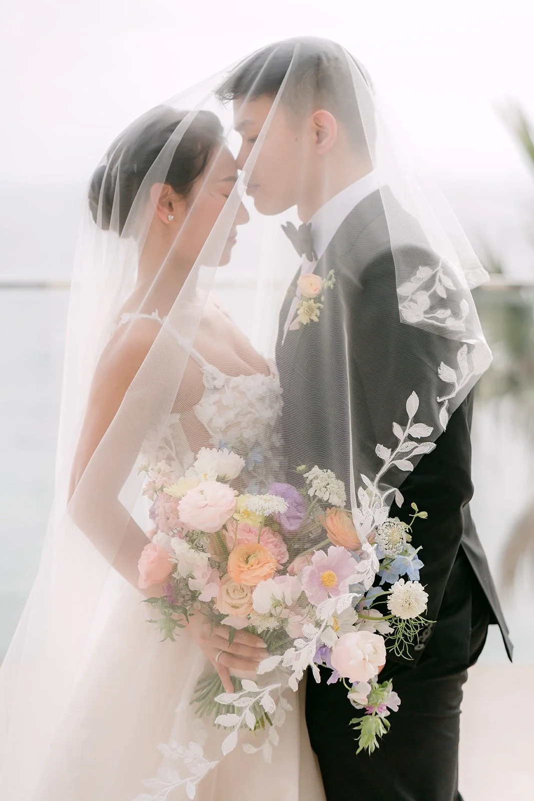 Kylie and Mario under her sheer veil