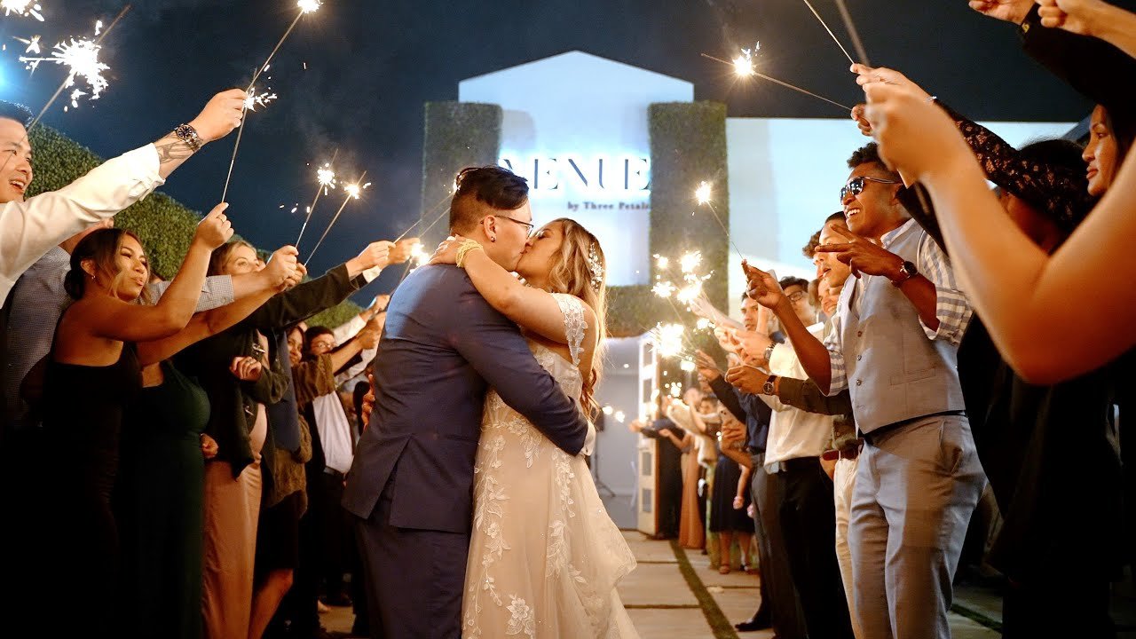Video still of a sparkler exit outside Venue by Three Petals at night, filmed by One and Only Production