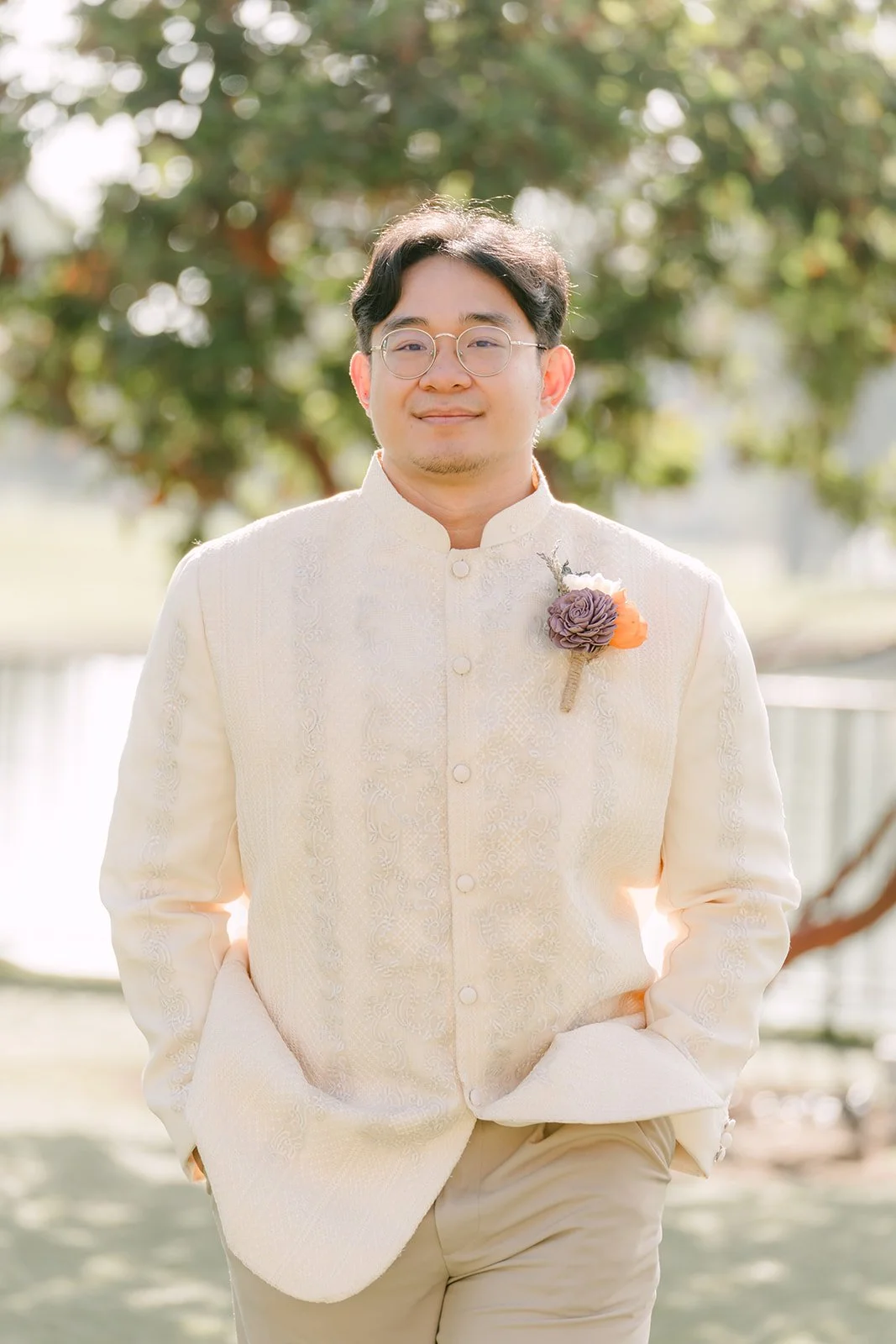 Jacob smiling in his cream barong