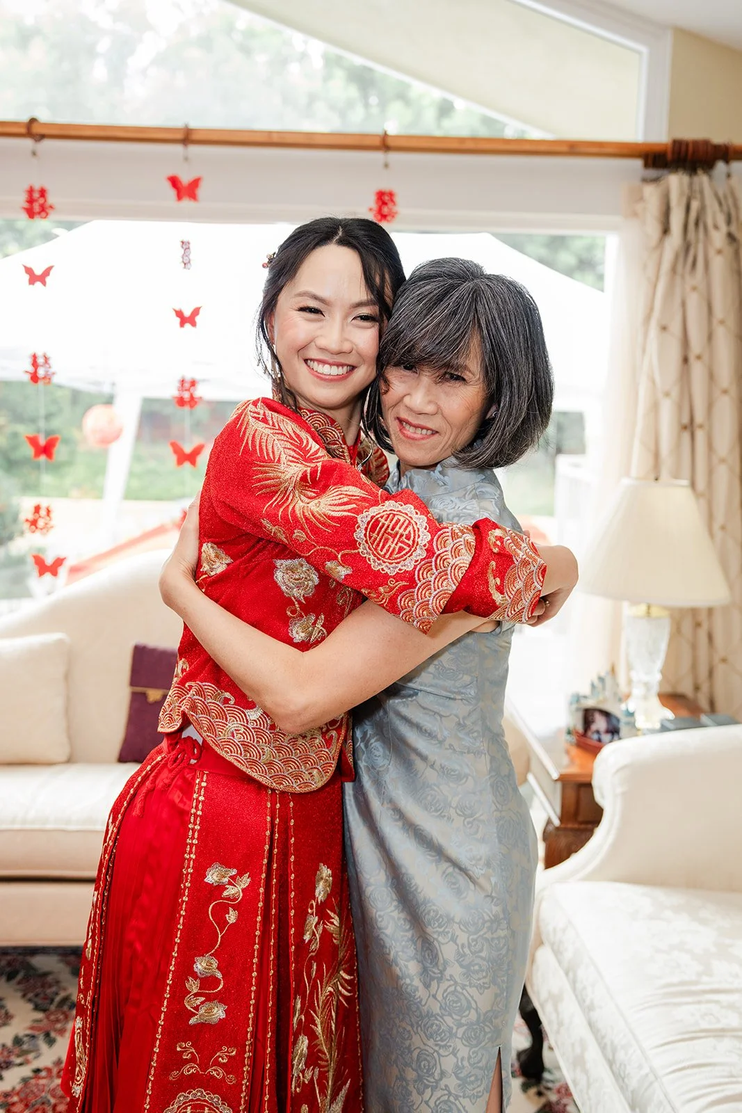 Bridgette hugging a relative after serving tea.