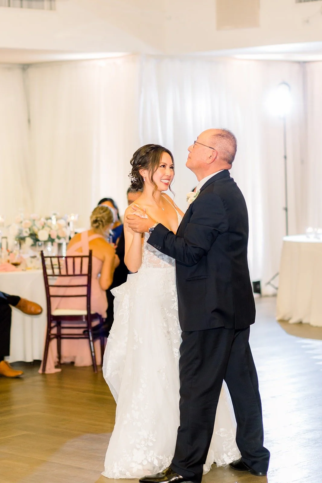 Josephine and her dad holding each other close, photographed by One and Only Production