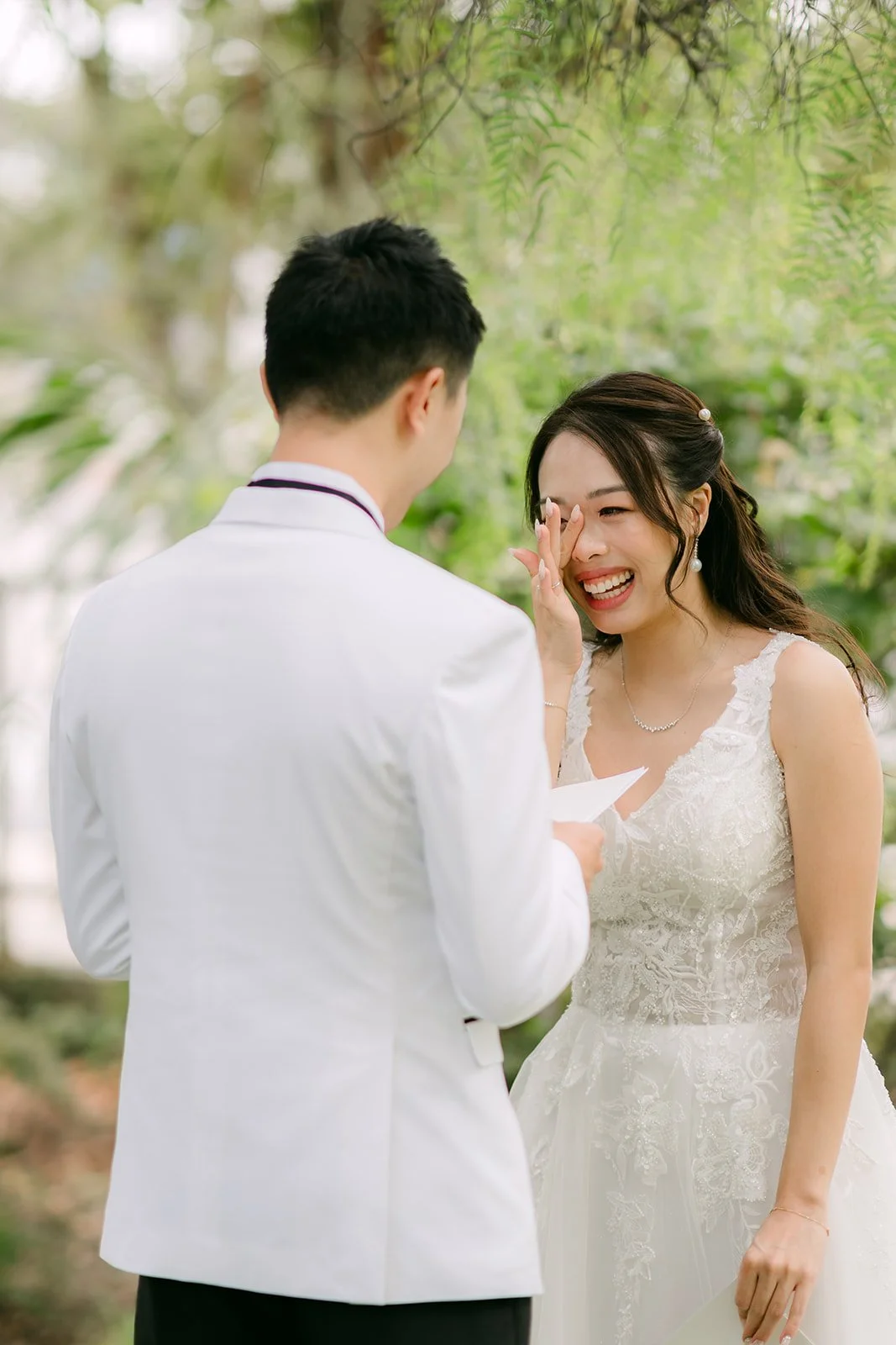 Jenny laughing during their private vows.