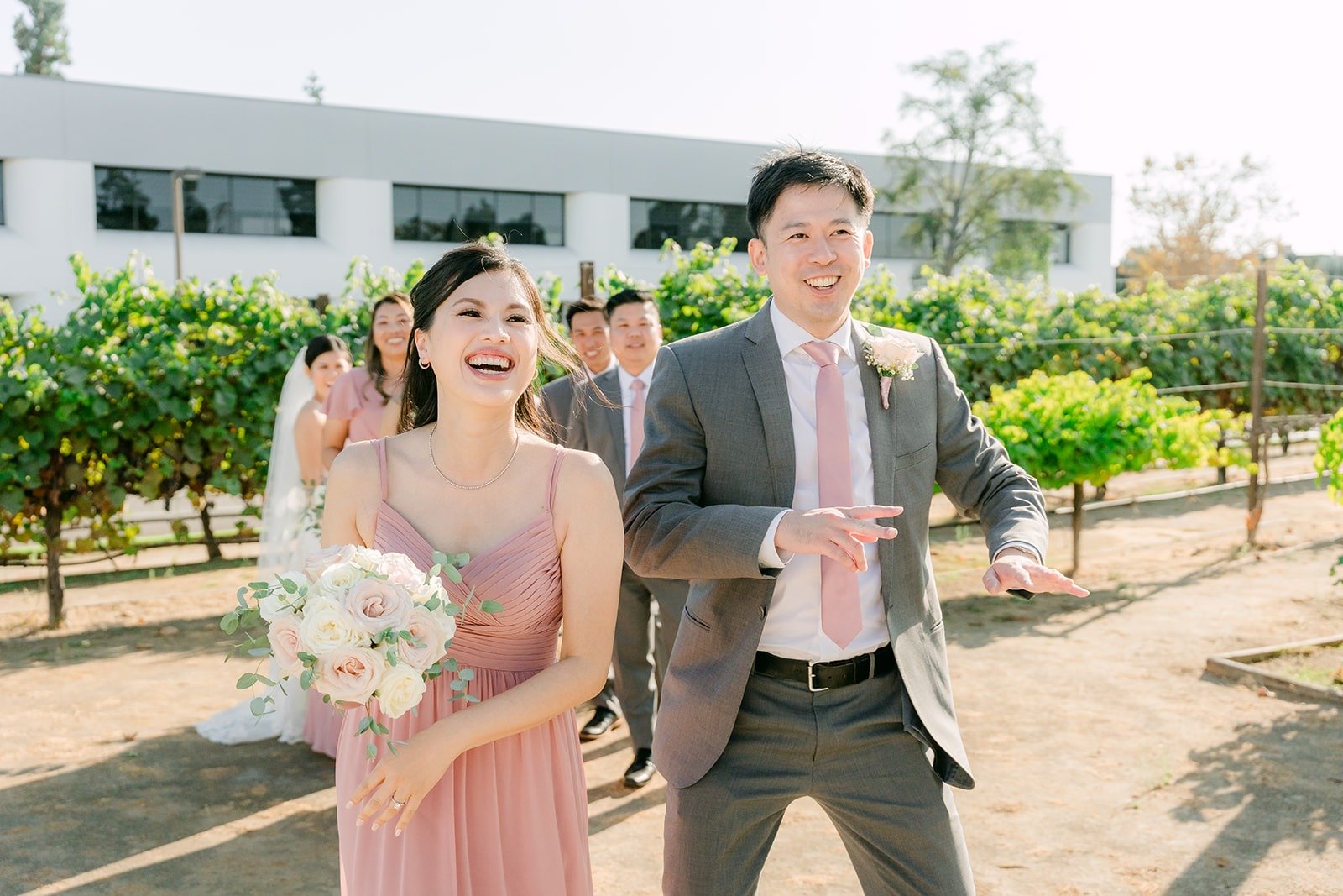 Xuemin and Alex laughing with a bridesmaid and groomsman