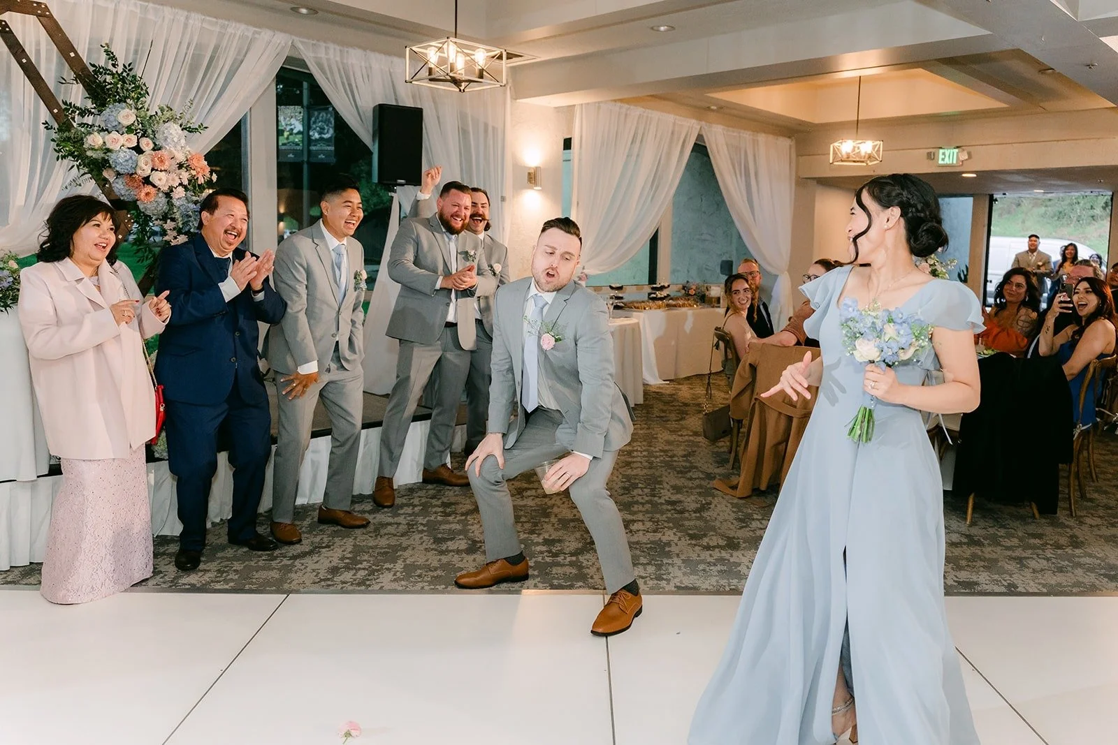Bridesmaids making their entrance into the Mediterranean Ballroom
