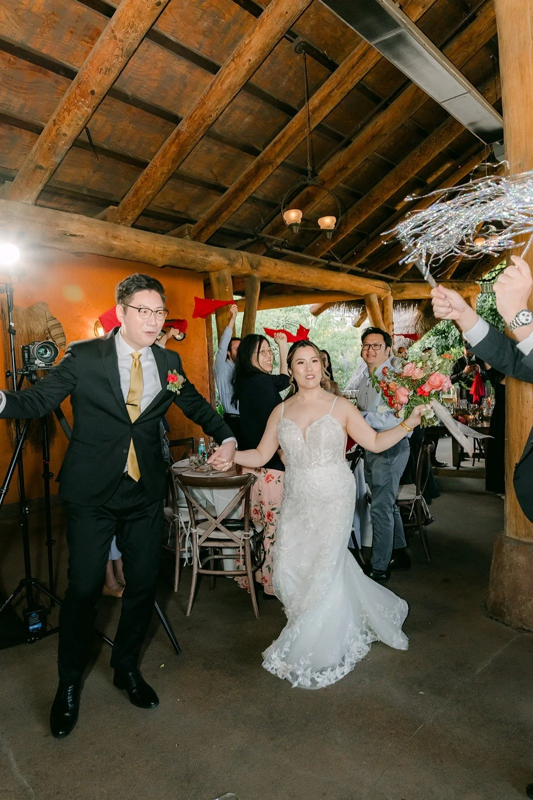 Joanne and Zach dancing into the reception at Kijamii Overlook
