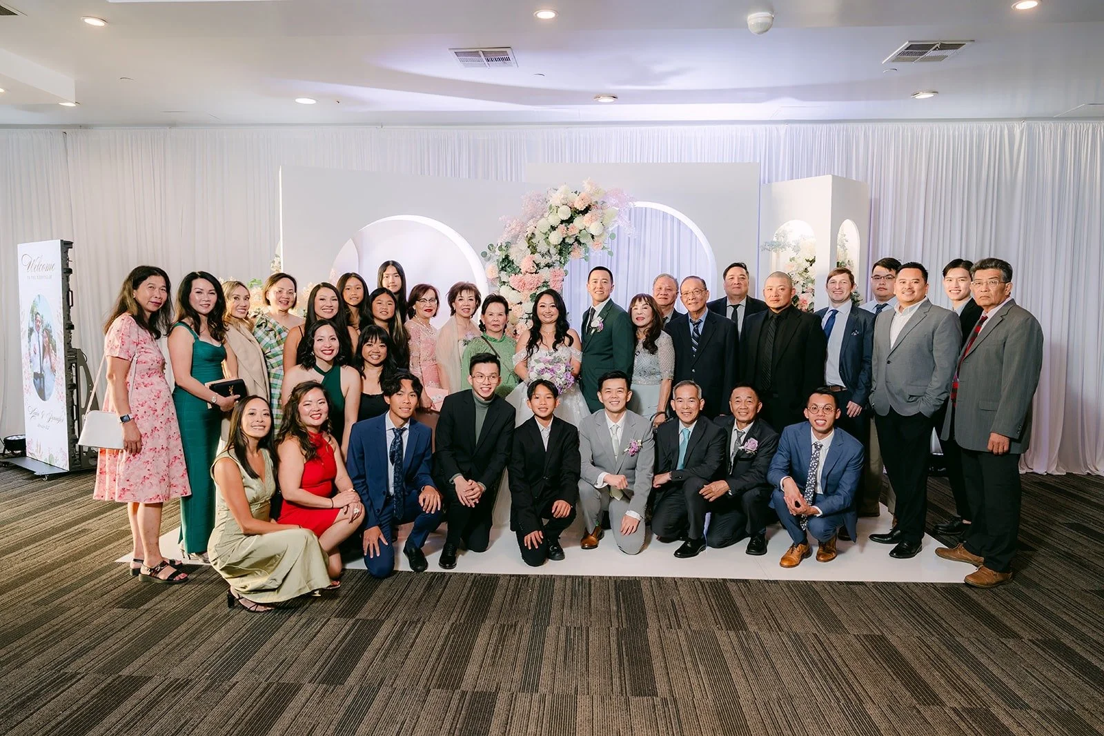 A big group photo of guests with Jennifer and Kevin at Diamond Seafood Palace 3, photographed by One and Only Production