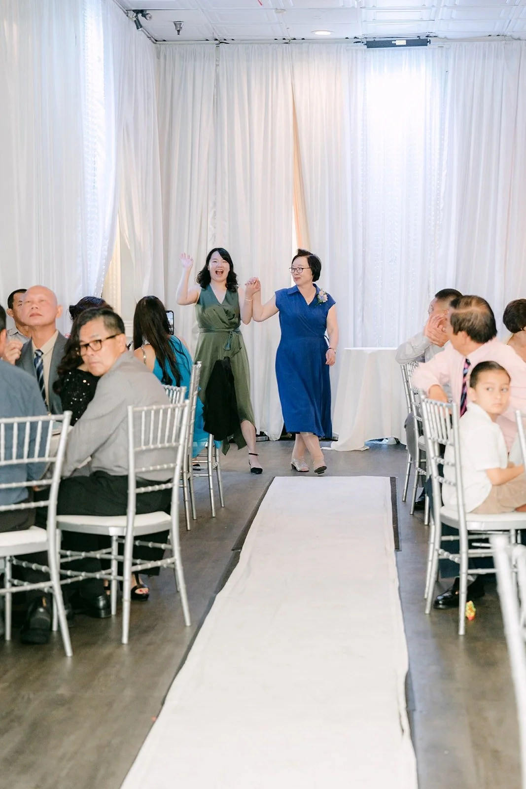 Family members walking in during the grand entrance