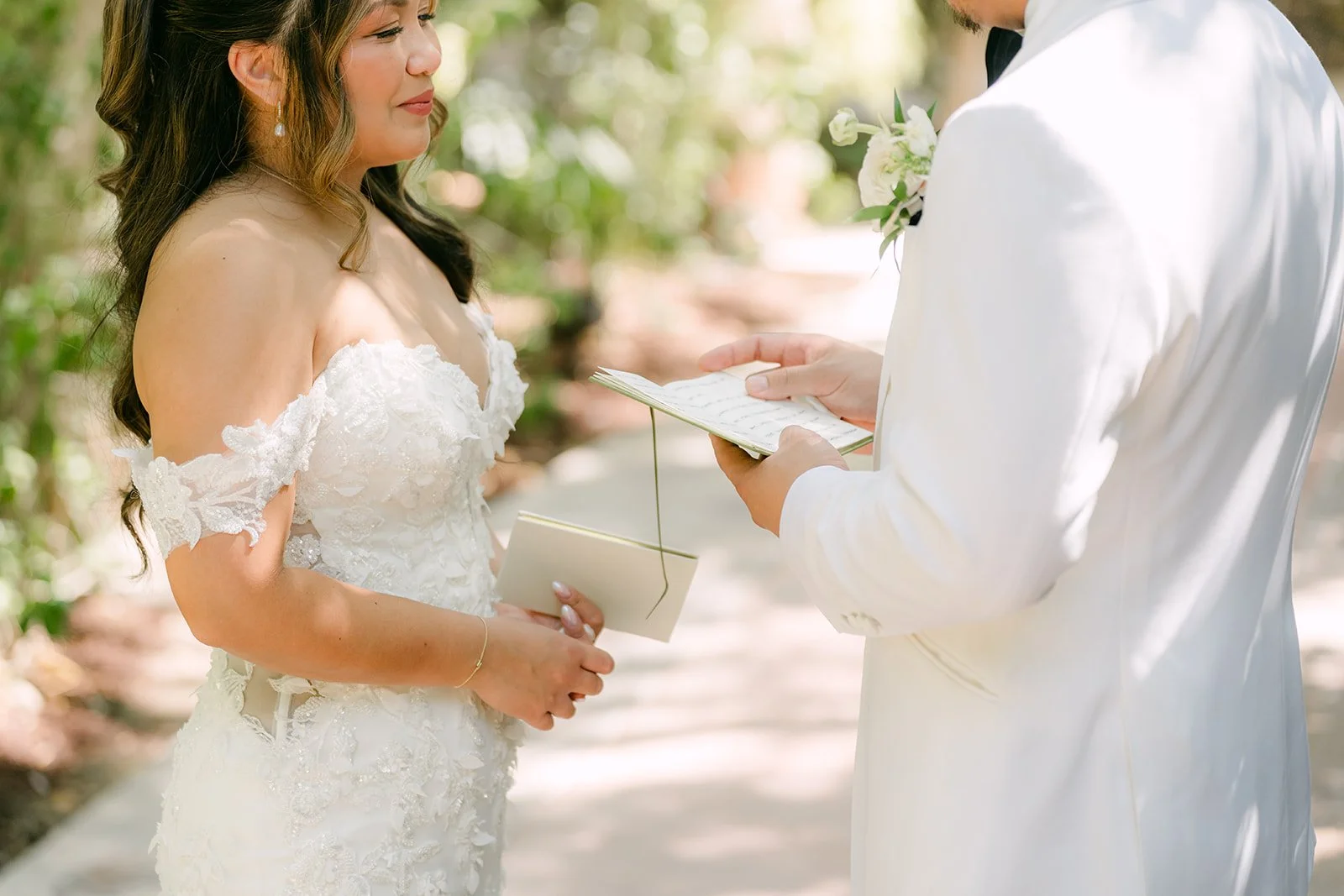 Close up of Nicole listening to Caryl's vows.