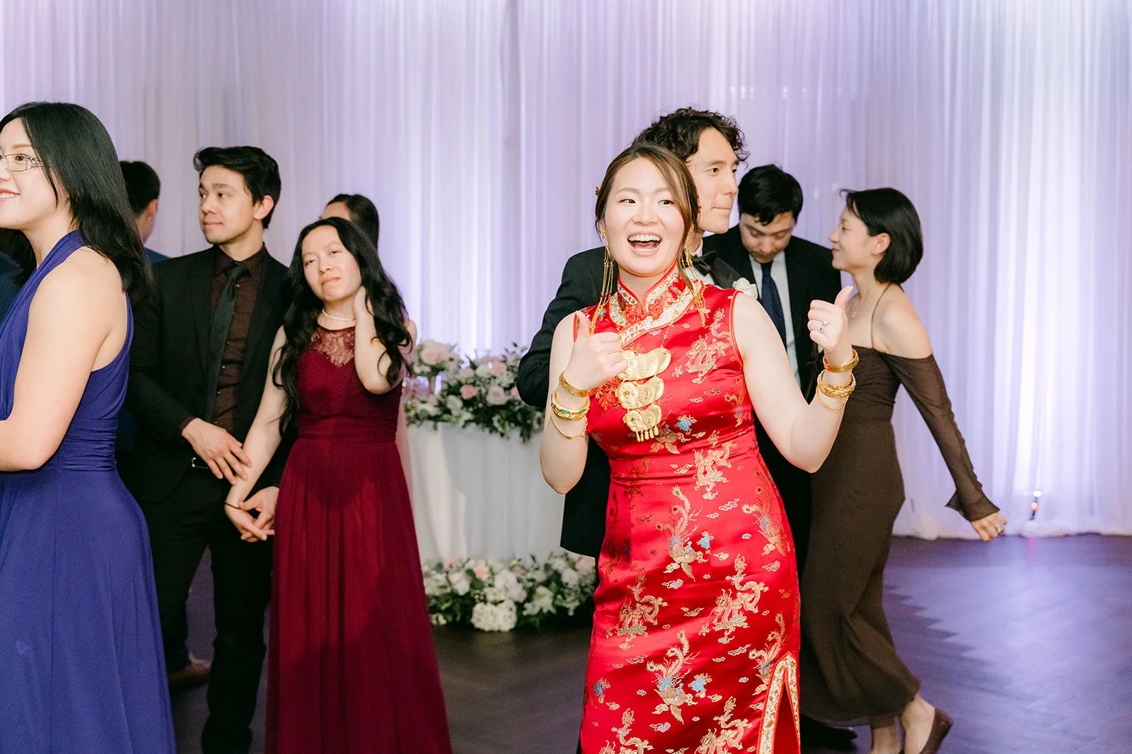 Bride dancing with friends as the dance floor opens