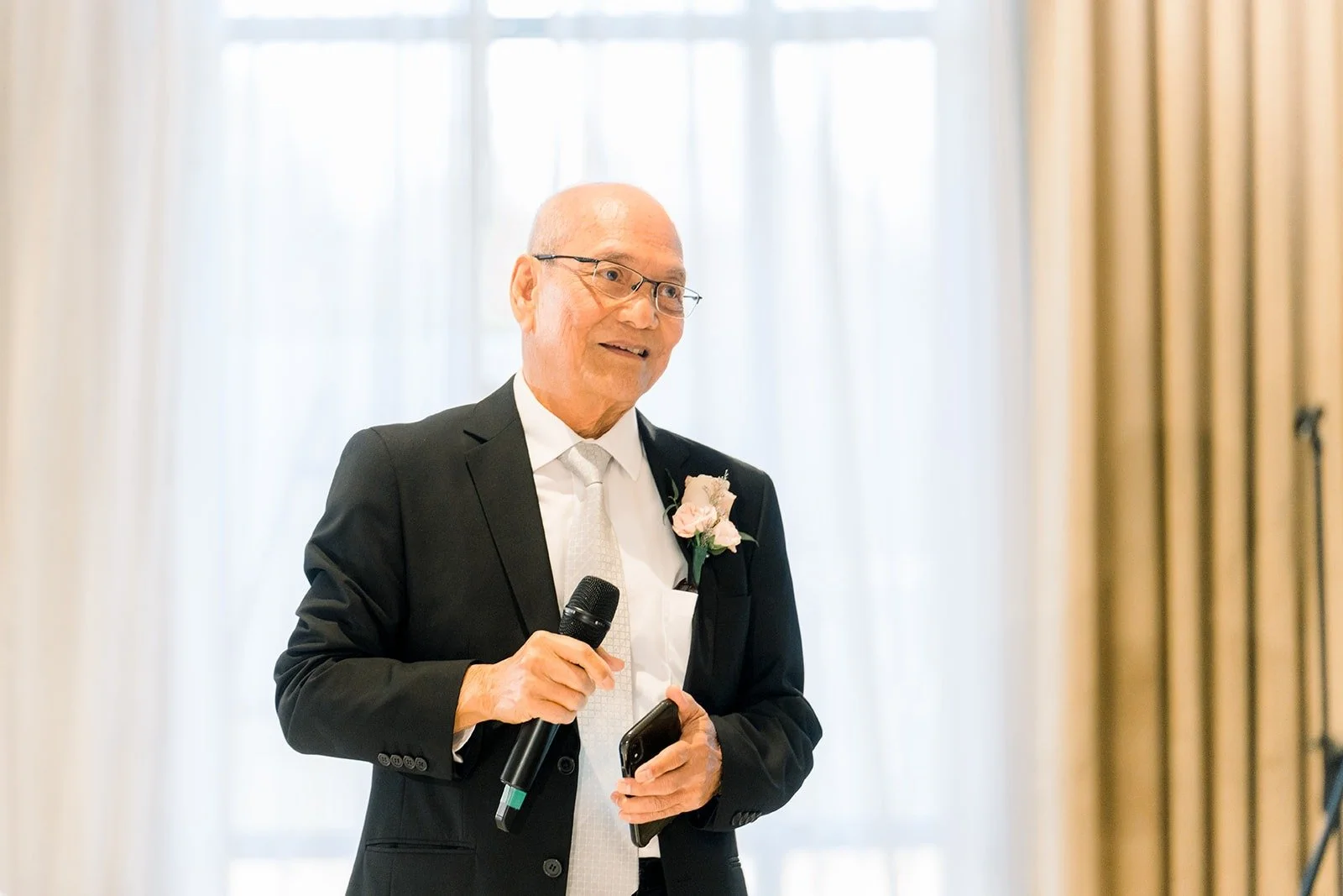 A guest giving a speech at the reception