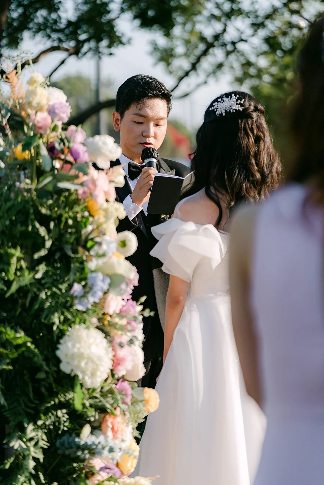 Jeannie smiling at Eunsang during the ceremony