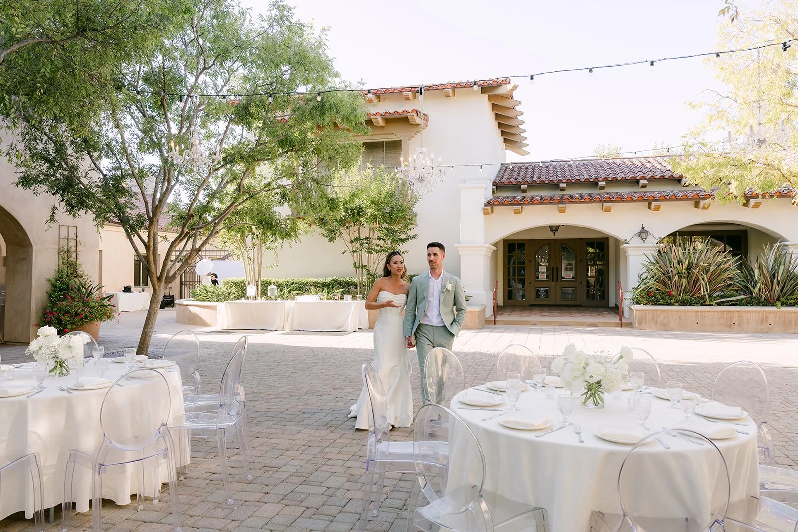 Kieu and Anthony taking a first look at their reception among the tables