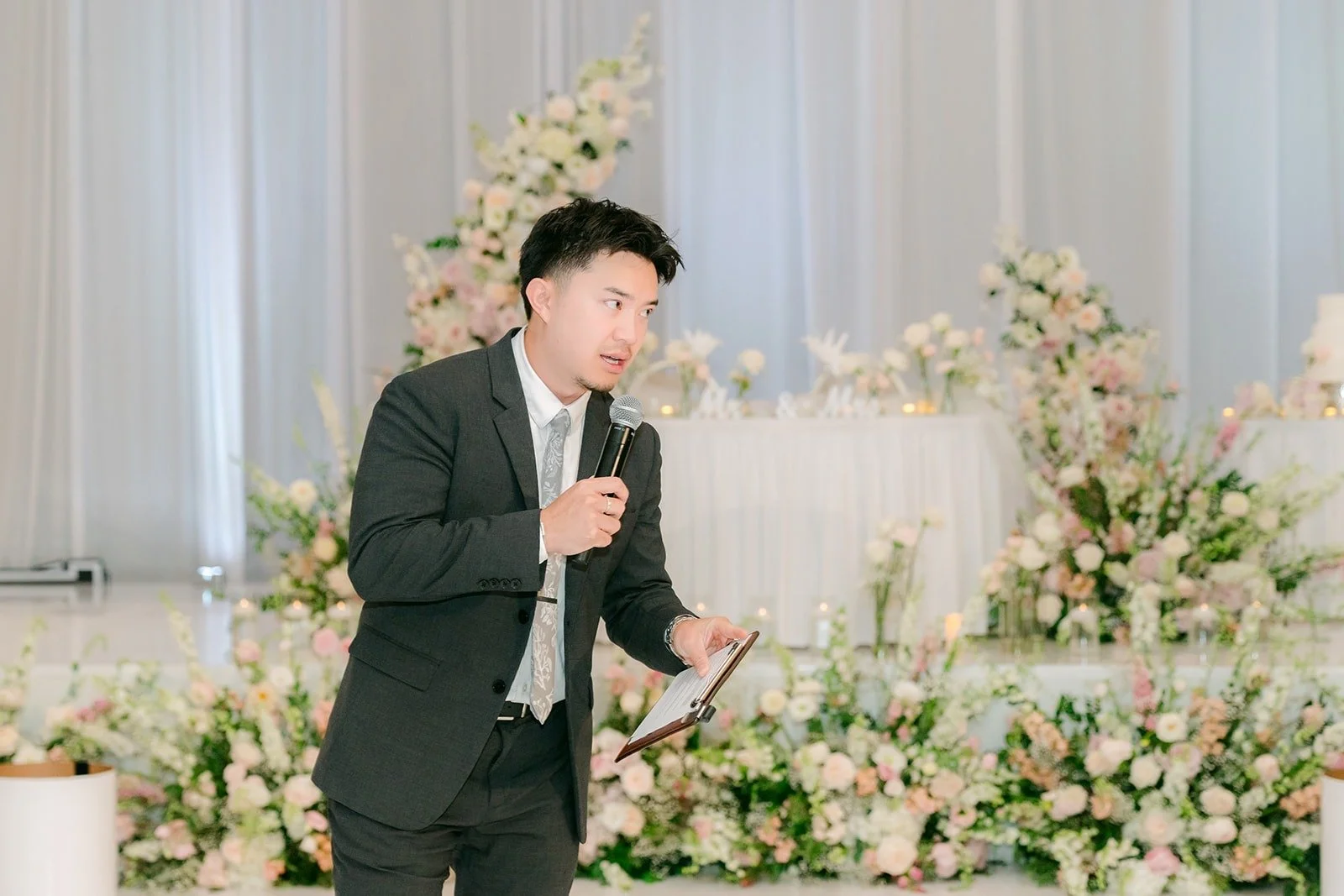 The emcee from 949 Studio hosting a game on the dance floor