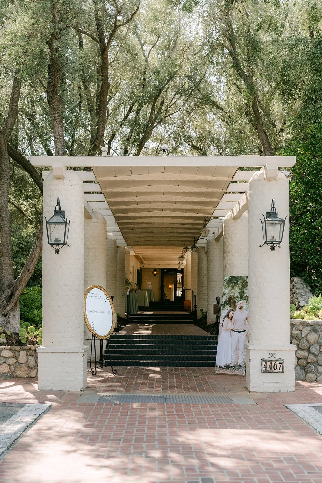 Lanterns and brick path leading into the Padua Hills lobby