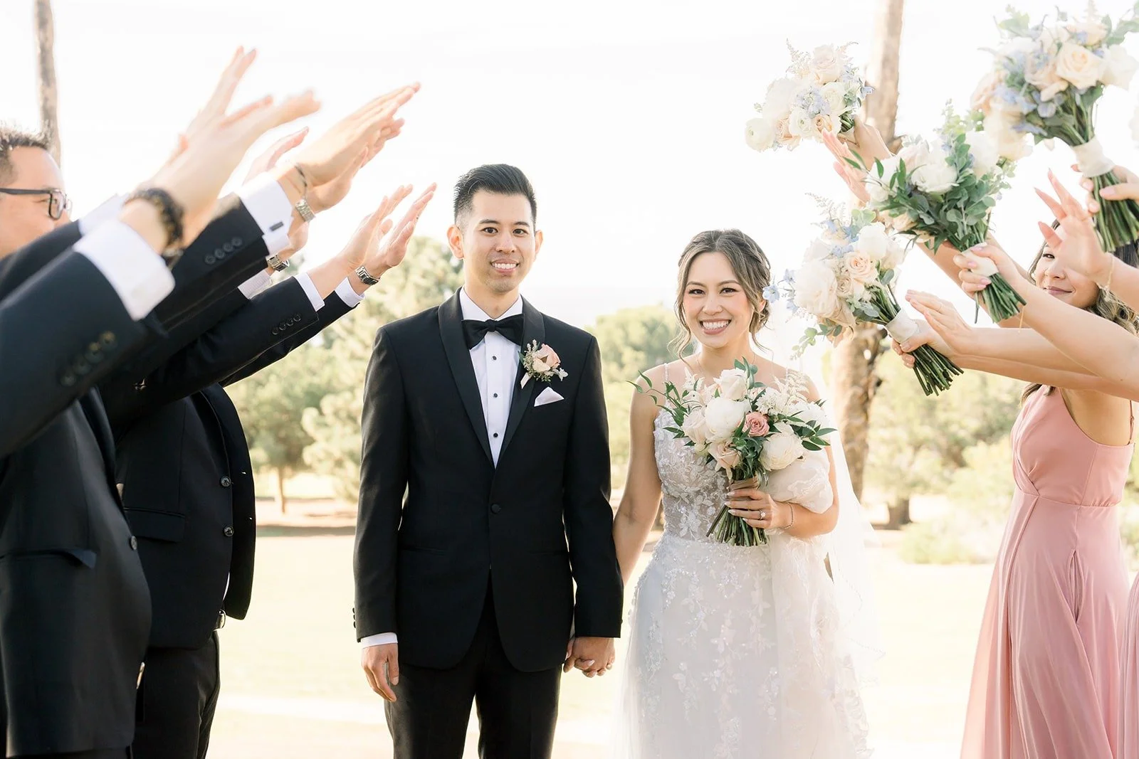 The groomsmen cheering for Josephine and David