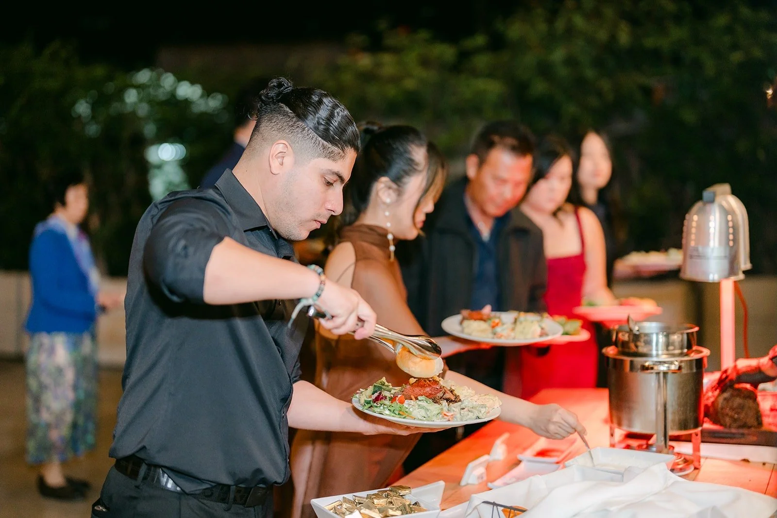Dinner being served outside at The Harper, photographed by One and Only Production