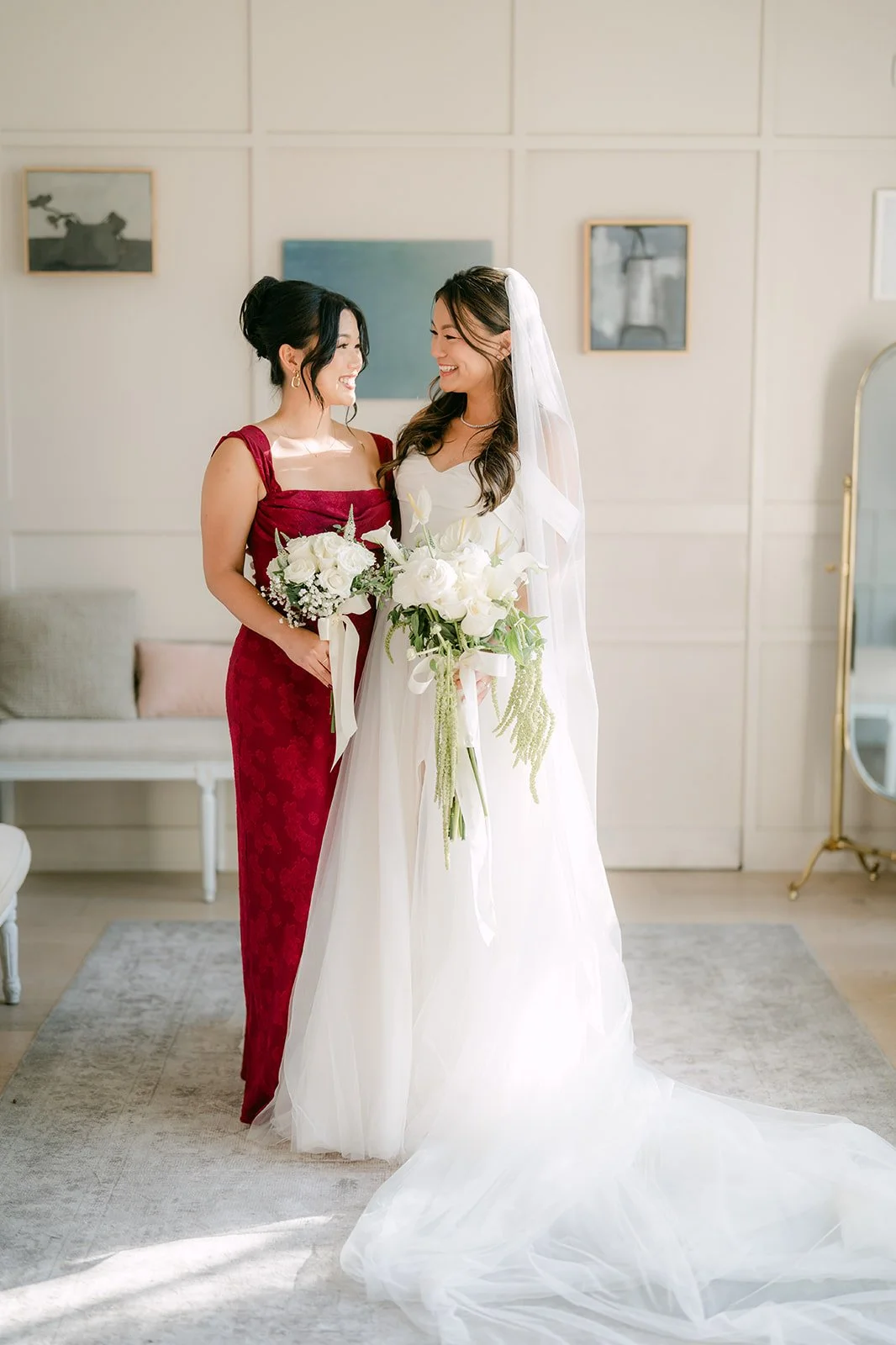 Jadee with her maid of honor in the bridal suite