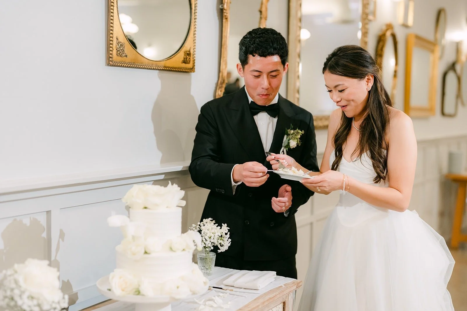 Jadee and Richard sharing a taste of cake