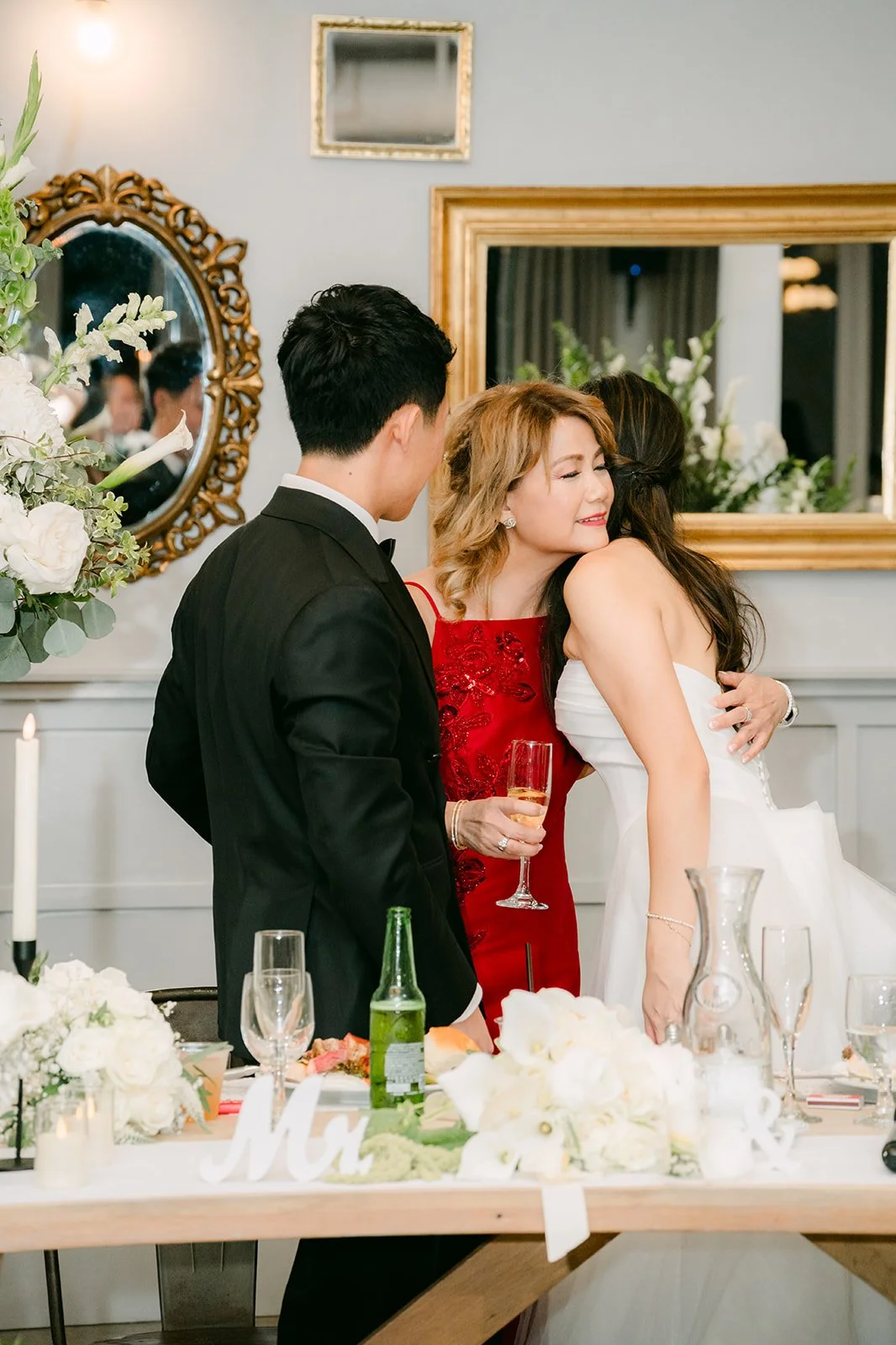 A friend giving a speech beside the sweetheart table