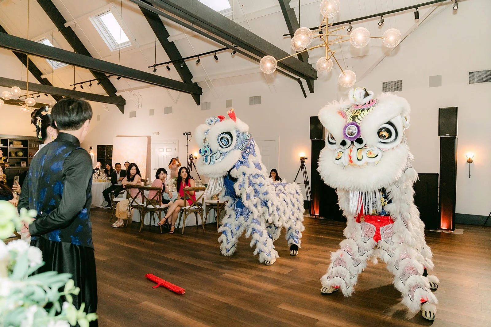A lion greeting guests at their table