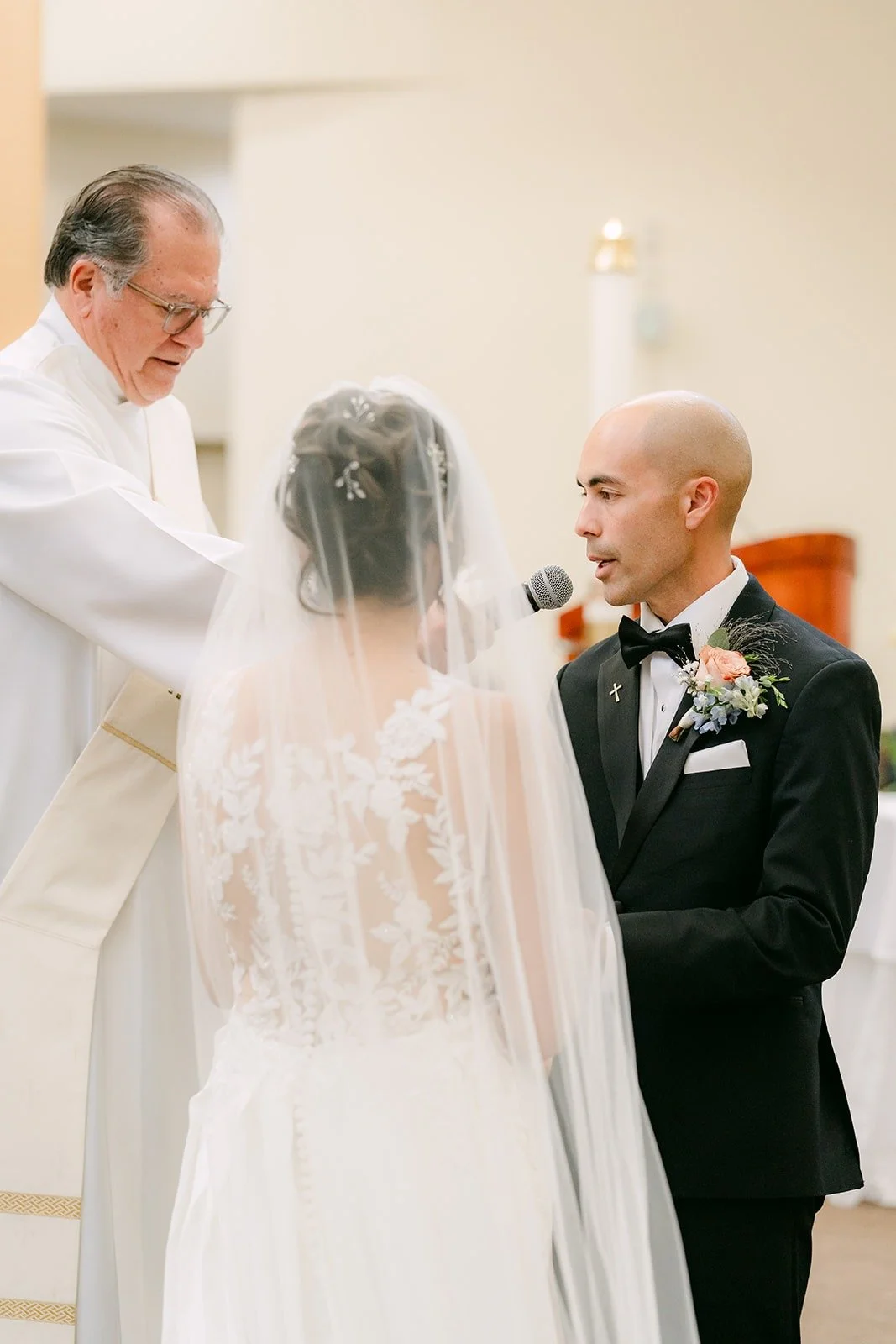 Daniel speaks his vows to Francesca in front of the priest