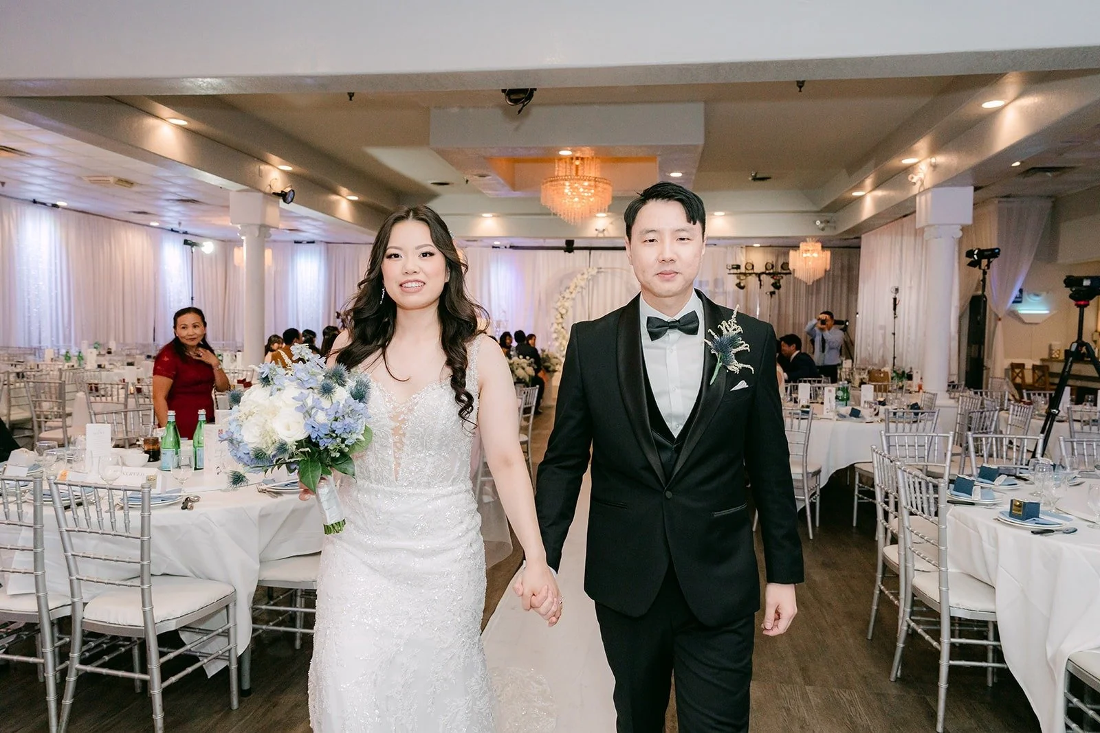 Emily and James heading out of the ceremony hand in hand
