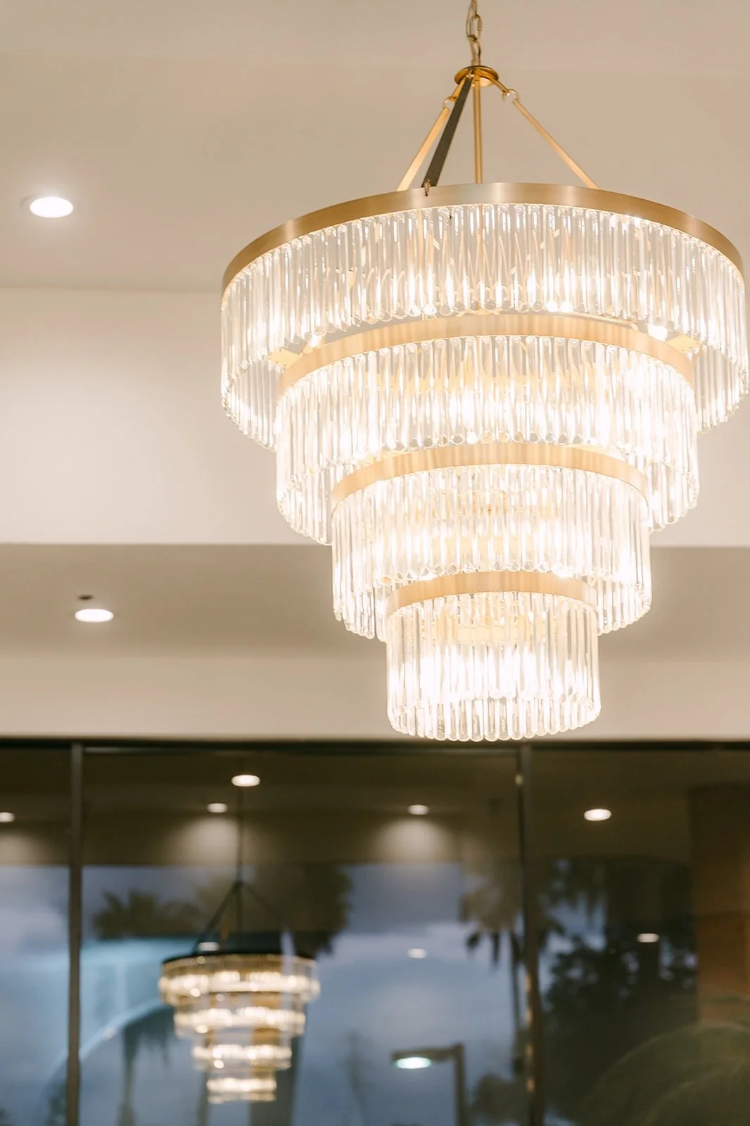 A crystal chandelier over the reception room
