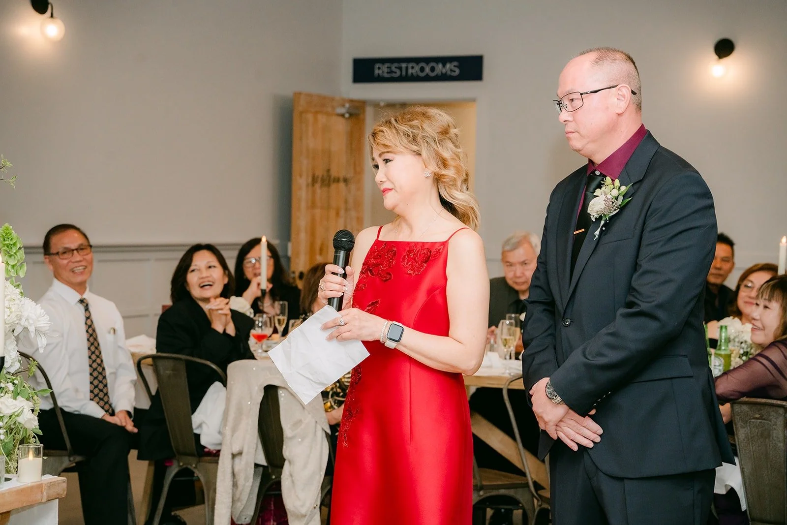 Two guests giving a speech together