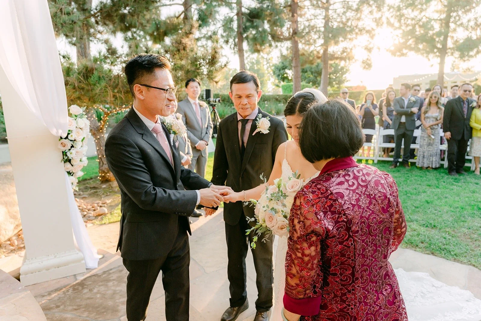 Alex greeting a family member at the end of the aisle