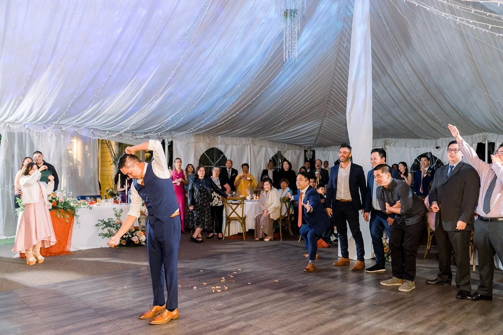 Guests waiting for the garter toss